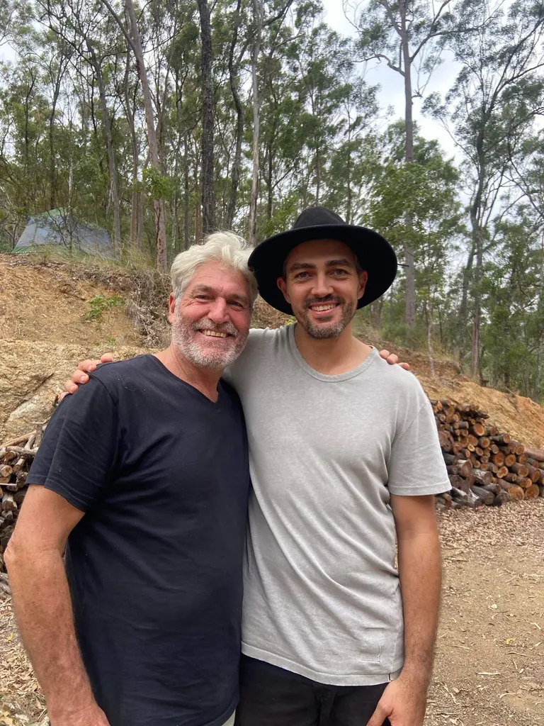 Max and Steve together after Max returned from four days alone in the bush on his first Quest